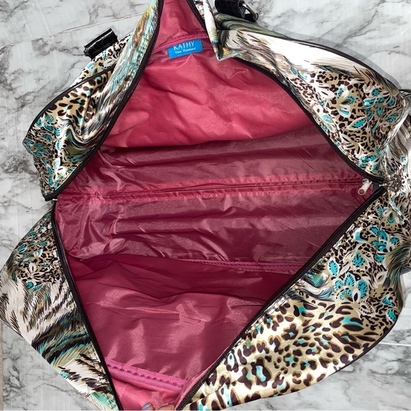 Kathy Van Zeeland Rolling Duffle Bag - Picture 12 of 16